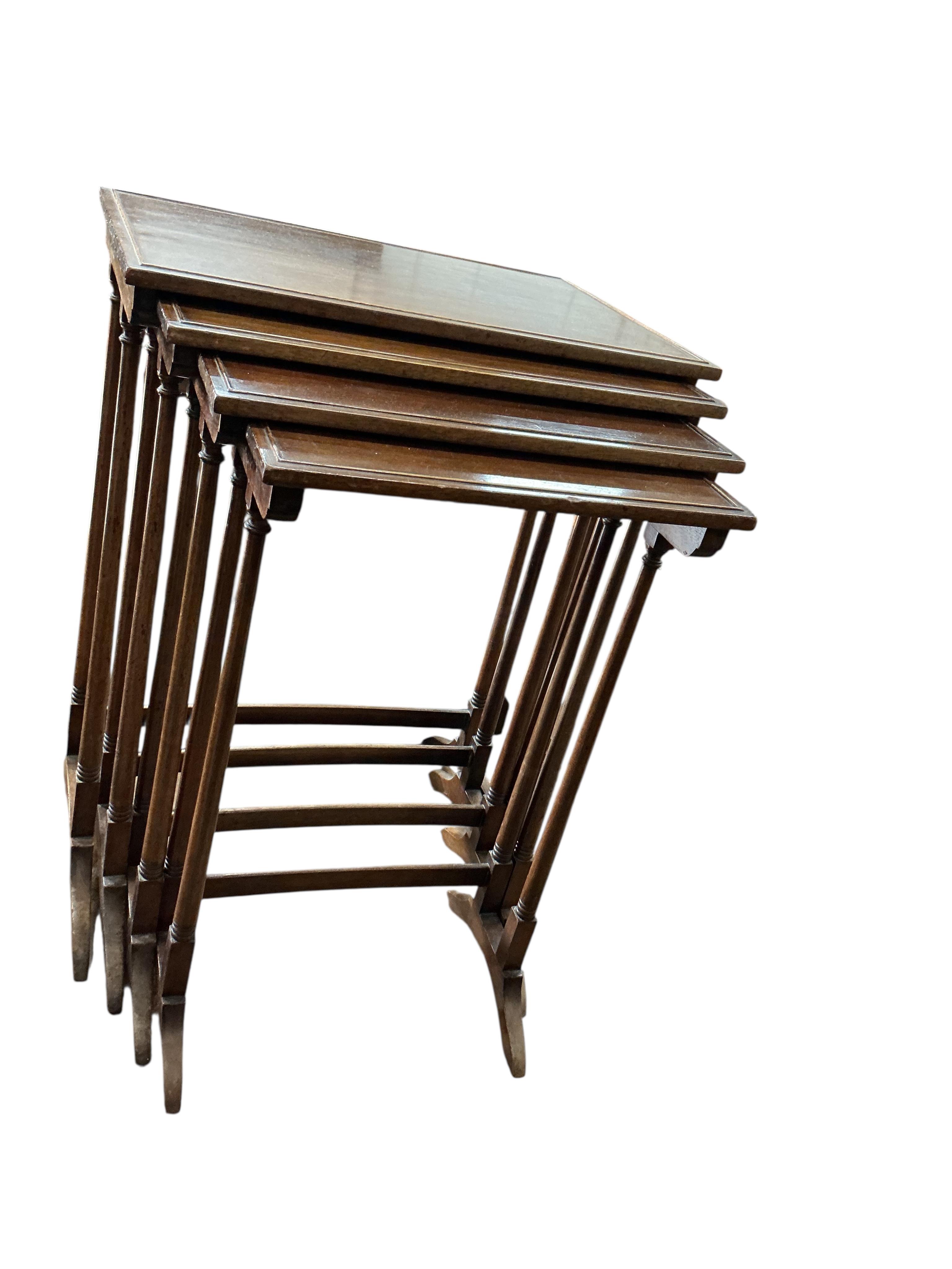 A quartetto of Edwardian rectangular mahogany tables, width 53cm, depth 36cm, height 70cm together with a George III style mahogany toilet mirror